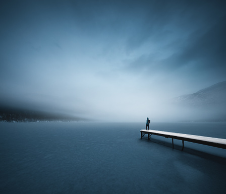 lonely man mountains fog nature fresh air landscape. High quality photo
