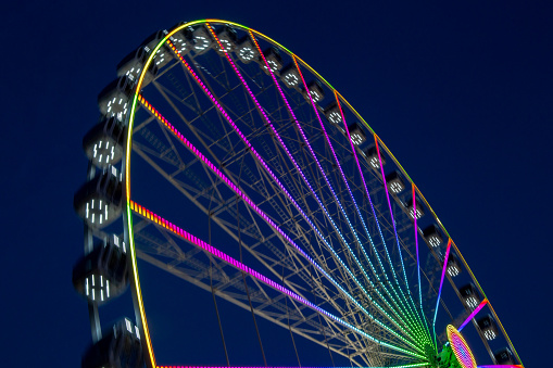 Symbol image of a fun fair: Ferris wheel at night
