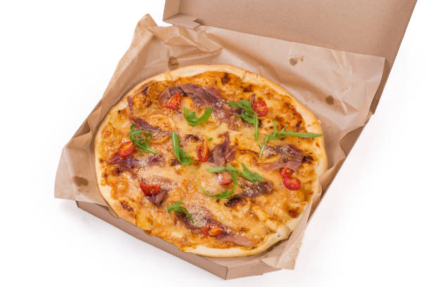 istock Pizza with ham in pizza cardboard box on white background 1420060033