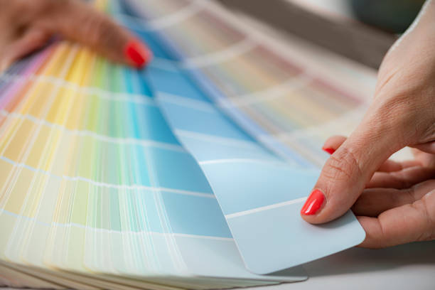 istock Designer Choosing Colors from Color Palette. 1420062776