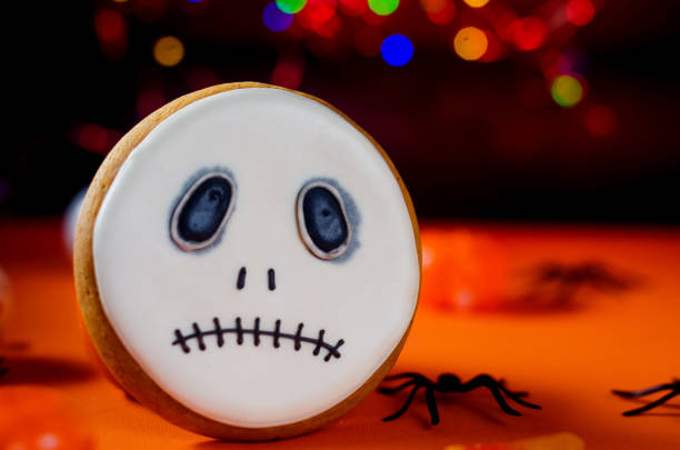 istock Halloween styled Gingerbread Cookies, candle and  spiders 1420063501