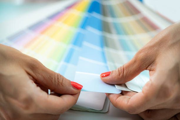 istock Designer Choosing Colors from Color Palette. 1420066812