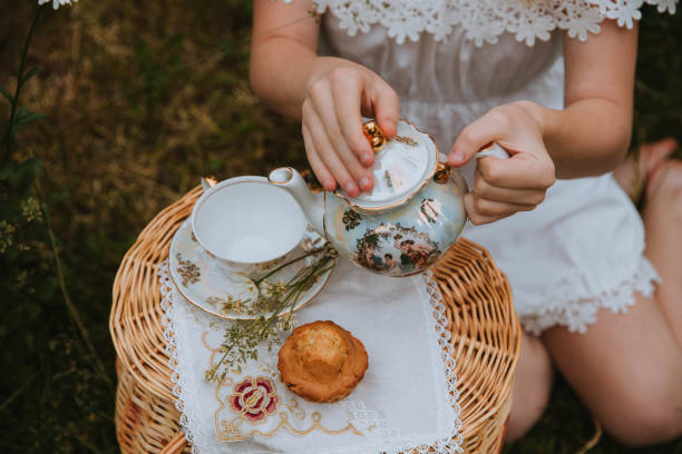 istock picnic, girl sits and drinks chamomile tea 1420067714