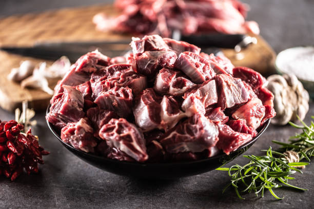 istock Fresh organic beef shank cuts in a bowl ready to be cooked with condiments. 1420069277