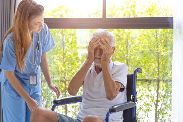 istock elderly senior man sick and sad cry with mental problem nurse support. Mental illness from health conditions. 1420069303