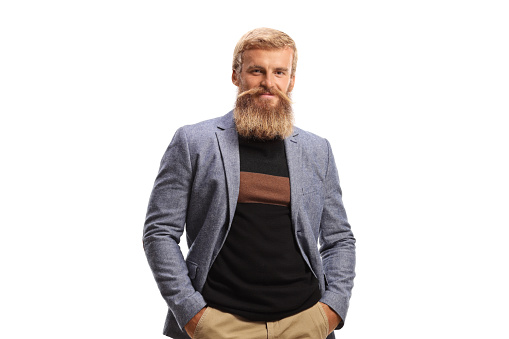 Young bearded guy with mustache posing isolated on white background