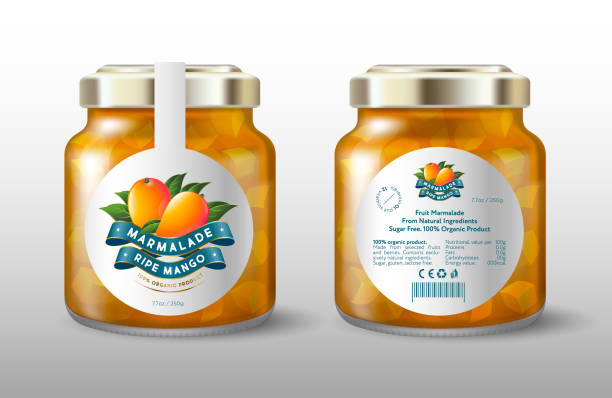 Mango marmalade. Ripe mango and silk ribbons. White round label for sweet preservation. Mock up of a glass jar with a label. Packaging and label for confiture or jam, sweet, preserved food. Label, packaging for organic products, health nutrition. mango jam stock illustrations