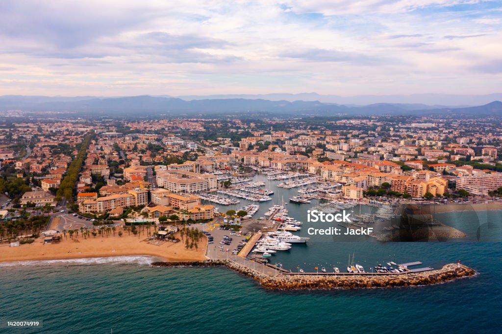 Aerial cityscape of France city Frejus with yachts in harbor Aerial cityscape of France city Frejus with yachts in the harbor Fréjus - France Stock Photo