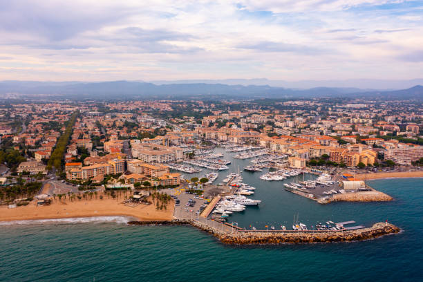 Aerial cityscape of France city Frejus with yachts in harbor stock photo