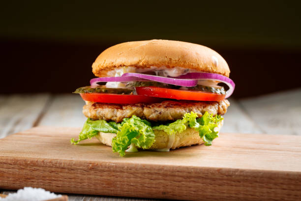 istock Closeup on classic hamburger with beef patty 1420079491