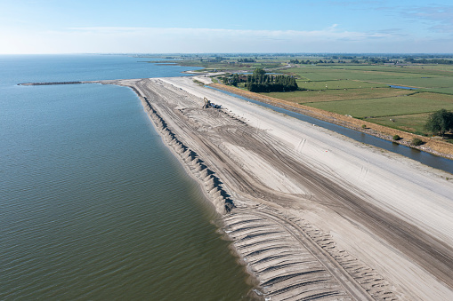 Building of extra dyke to protect the Netherlands of sea rising