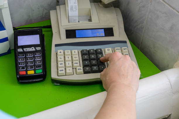 Cash register in a clothing store, in fashionable women's clothing store, in boutique. Shopping.