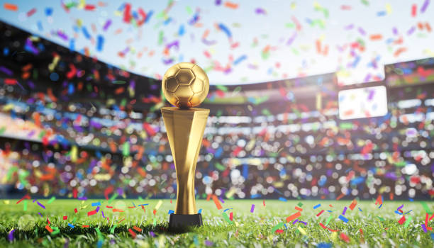 Golden Cup in football stadium Golden Cup in football stadium fifa world cup stock pictures, royalty-free photos & images