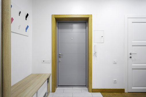 Entrance door inside an apartment building in a modern interior
