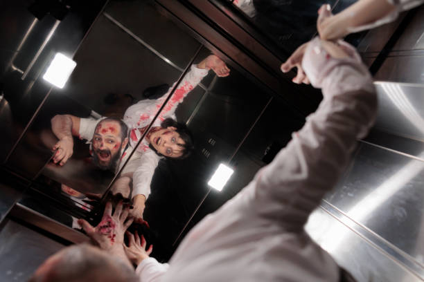 istock Creepy cruel zombies sitting in elevator 1420091852