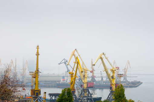 Gothenburg, Sweden - July 5, 2019: Old Harbour Cranes in sea channel of Gothenburg, there were used for buildings ships