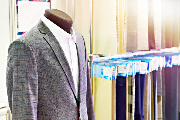 istock Men suit with shirt in textile shop 1420102380