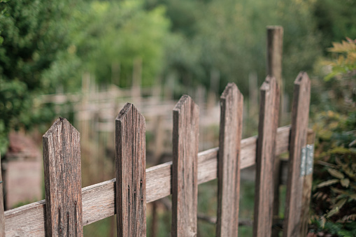 wooden fence, selective focus, bokeh and copy space