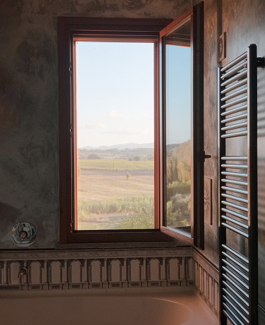 View on the Tuscan countryside from the bathroom window