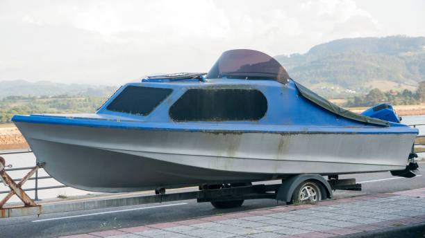 istock Old blue jet boat out of water 1420103976