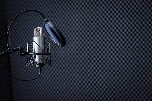 Professional Microphone in Recording Studio with  blank copy space background