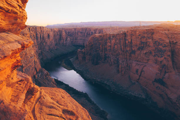 Grand Canyon at the Horseshoe Bend at sunset Deep inside the Grand Canyon this magical place called Horseshoe Bend can be found. Seen at sunset near the city of Page, Arizona, USA. horseshoe bend river stock pictures, royalty-free photos & images