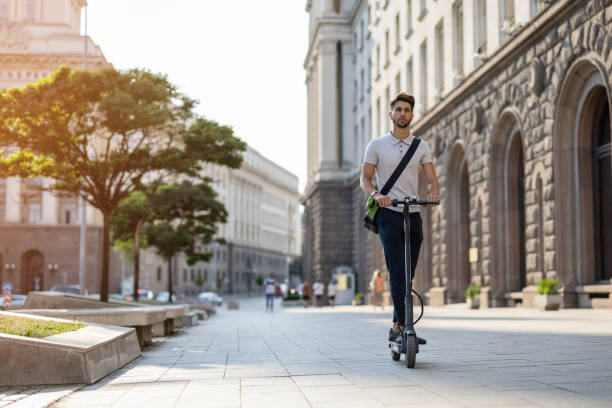 istock Student going to school on an electric scooter 1420113074
