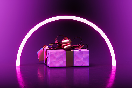 Pink Colored Gift Box With Neon Lighting Background