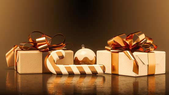 Black gift box with gold satin ribbon bow, over white background.