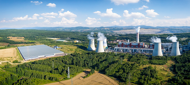 Aerial view of the huge tomato greenhouse and lignite power plant in Turów, Turoszów, Poland