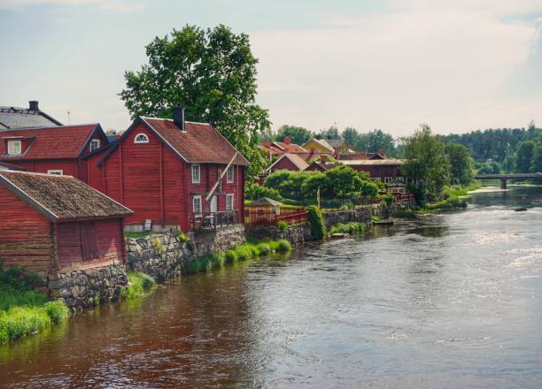 istock scenic view of river by buildings against sky 1420116356