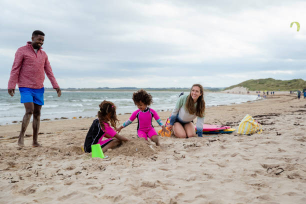 istock Family Having Fun at the Beach 1420117215