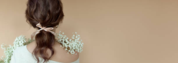 istock A girl with flowers. 1420120353