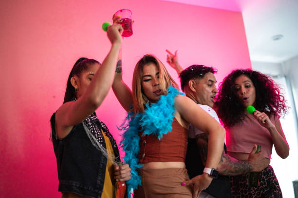 istock Friends dancing and having fun at a house party 1420122190