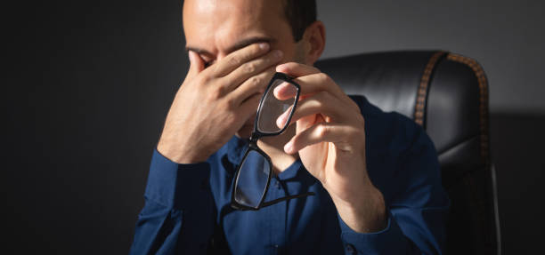 istock Caucasian man with eye fatigue. Stress. Eyesight problem 1420123337