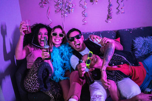 istock Drunk friends with beer having fun at a party 1420124119