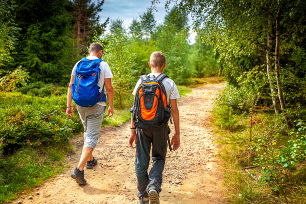 istock Father and son on a mountain trip 1420128943