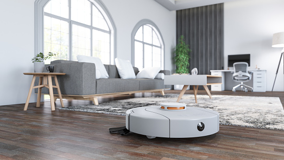 Robotic Smart Vacuum Cleaner on Parquet Wood Floor in a Modern Living Room. 3D Render