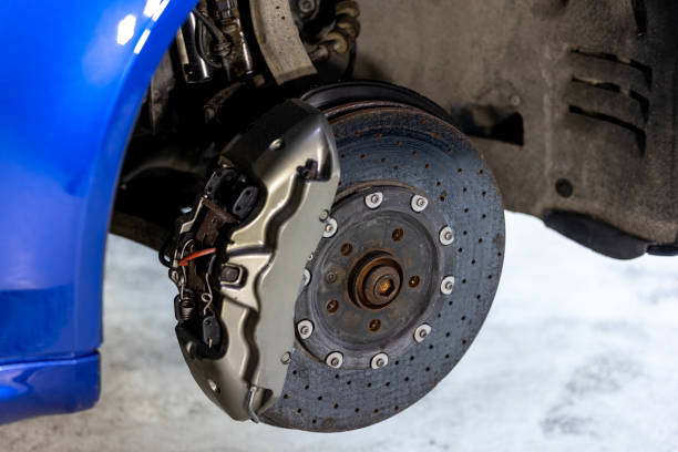istock Automobile brake disc without wheels, car service concept 1420140048