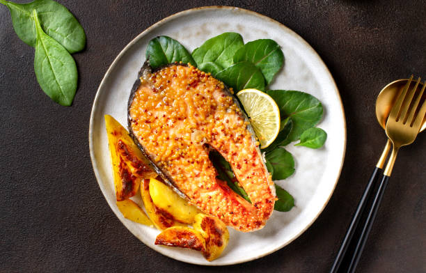 istock Salmon steak baked on a plate 1420147439