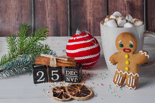 Christmas decorations and gingerbreads on a dark concrete table. Preparing and decorating the house for holiday