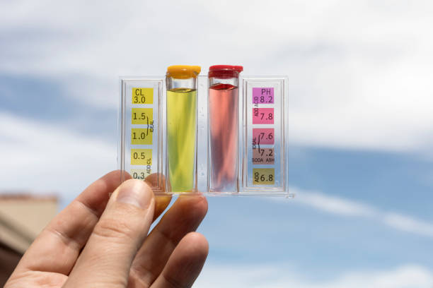 istock PH and chlorine analysis kit for swimming pools. Liquid chlorine and PH meter for swimming pools. Liquid reagent for pool maintenance. Analysis system for water quality and quantity of PH and Cl. Test 1420151931