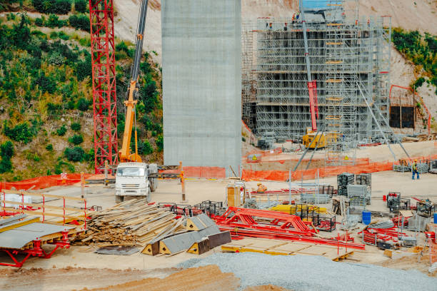 istock Constructing concrete pillars of the bridge. Construction of the new M12 highway 1420152748