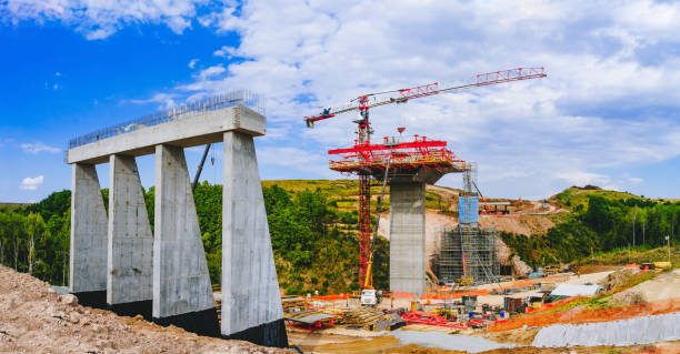 istock Constructing concrete pillars of the bridge. Construction of the new M12 highway 1420152753