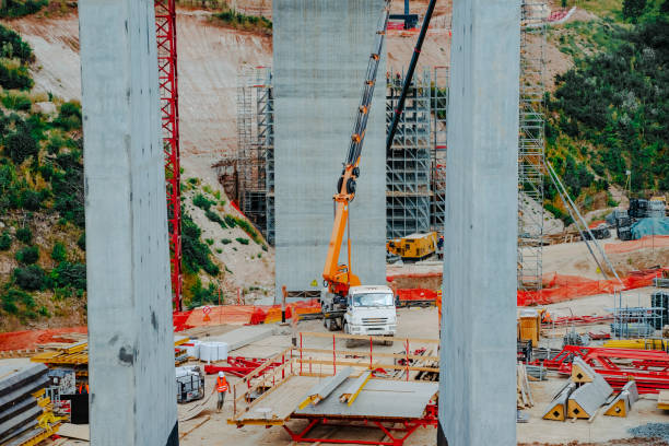 istock Constructing concrete pillars of the bridge. Construction of the new M12 highway 1420152788