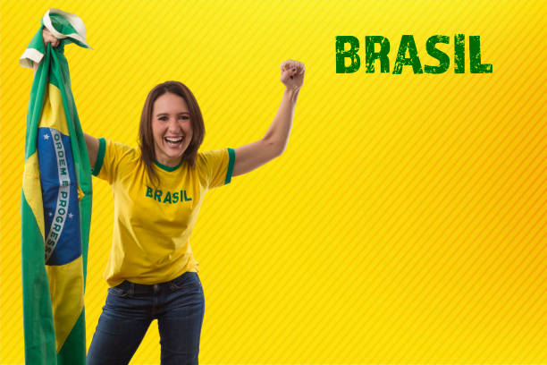 istock Female brazilian fan celebrating 1420158700