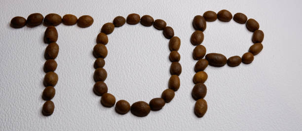 istock Lettering top with coffee beans on a white background 1420160282
