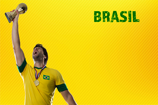 brazilian player, man celebrating on a yellow background.