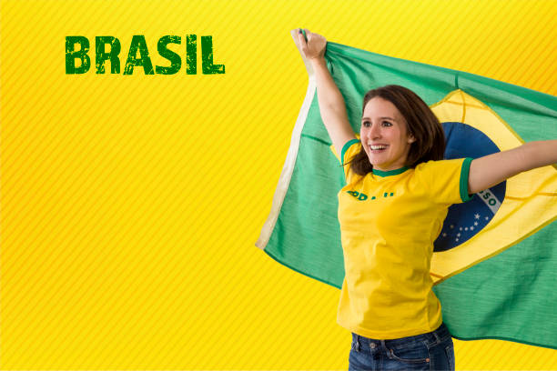 istock Female brazilian fan celebrating 1420160974