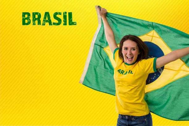 istock Female brazilian fan celebrating 1420161538